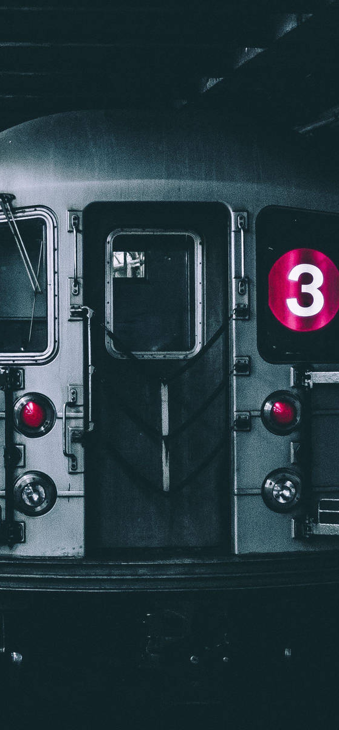 A subway train at an underground station with a pink number three sign. – Ultra HD iPhone 18 Landscape Wallpapers