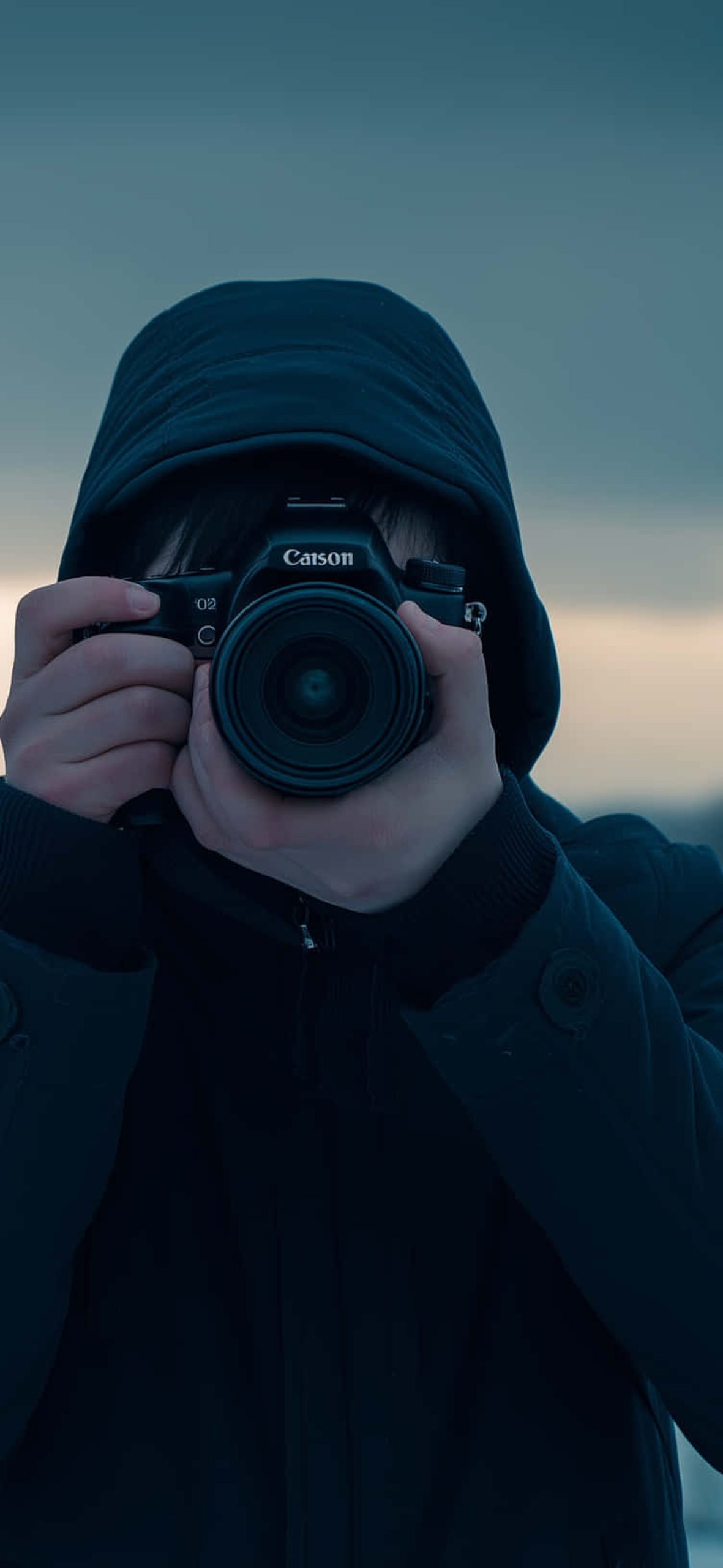 Mysterious Photographer In Hoody With Camera Winter Setting – Ultra HD iPhone 18 Landscape Wallpapers